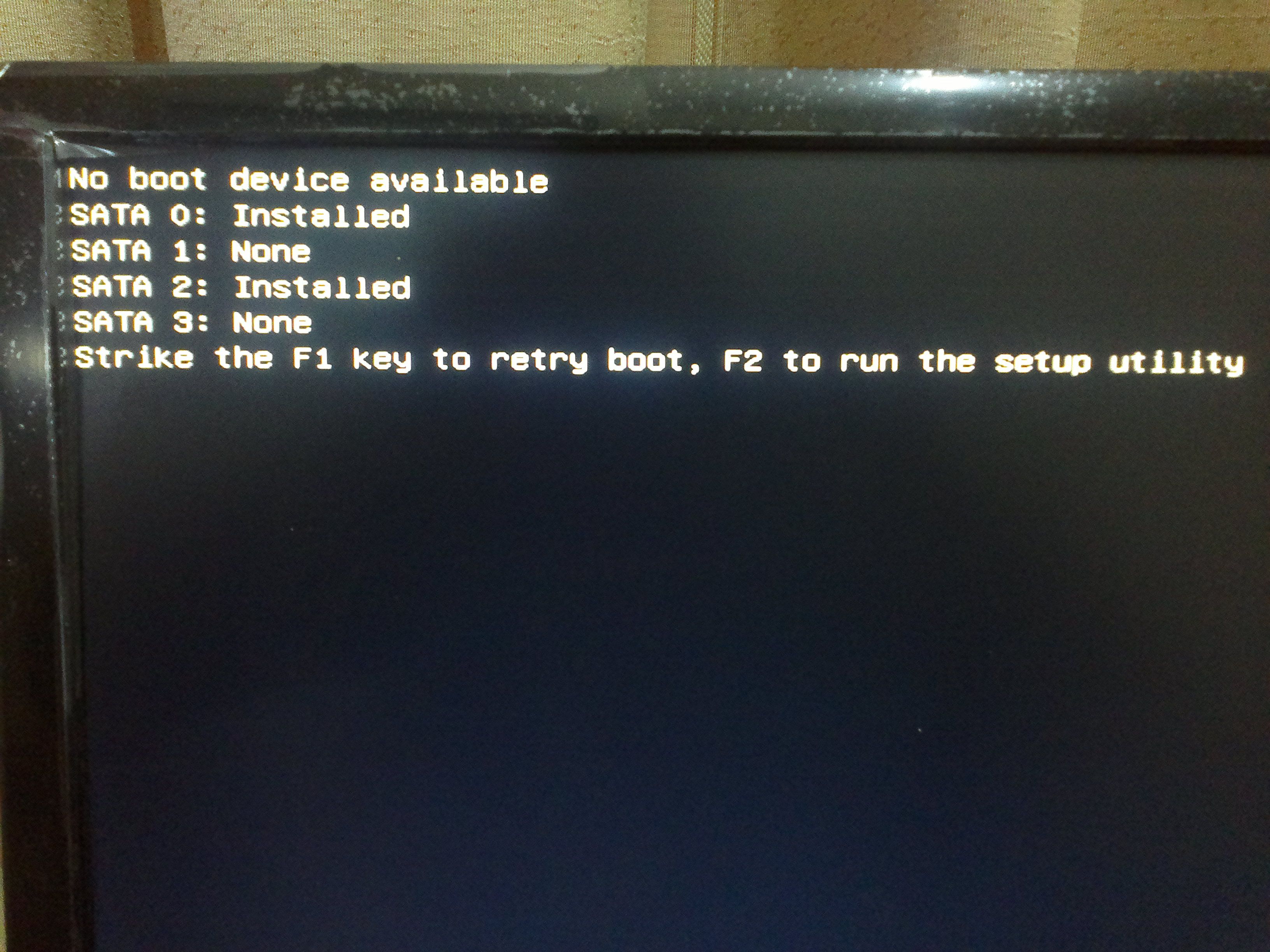电脑开机后就显示Reboot  and  Select  proper   Boot   device然后我就重新启动电脑按F1进入了BIOS了之后我应该怎么办？