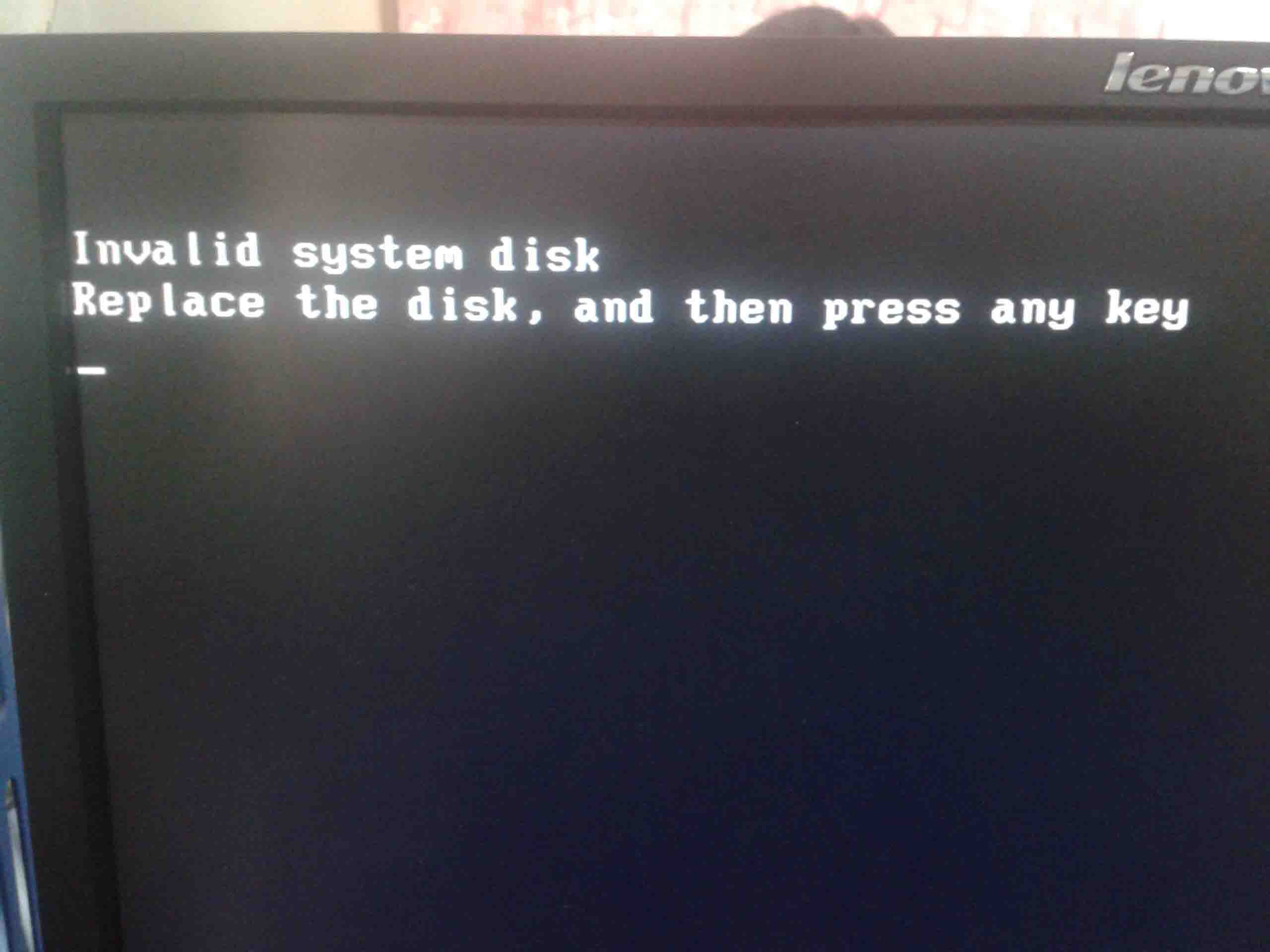电脑开机显示Invalid system disk怎么办？